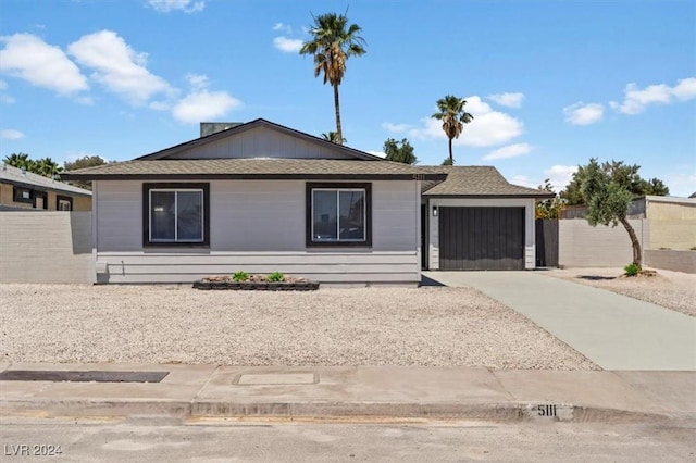 ranch-style home with a garage