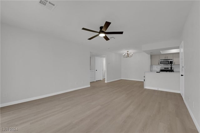 unfurnished living room with ceiling fan and light wood-type flooring