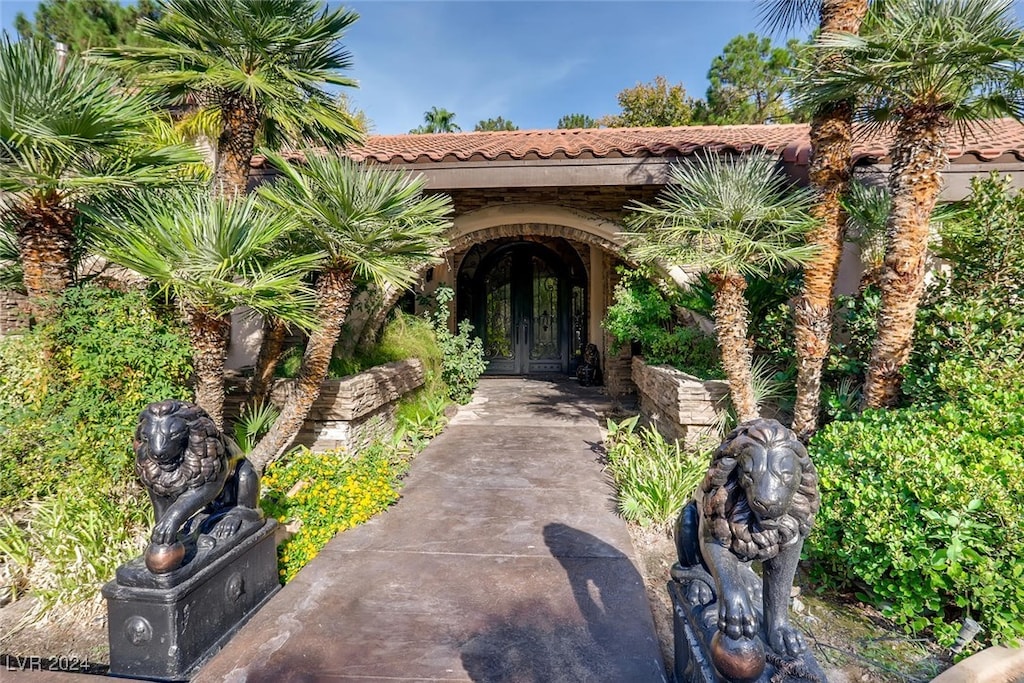 property entrance featuring french doors