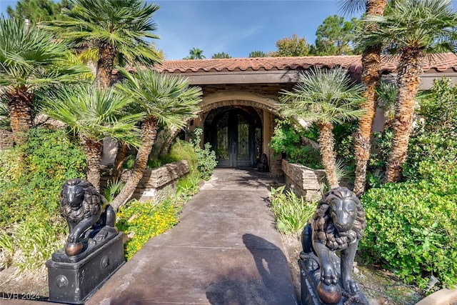 property entrance featuring french doors