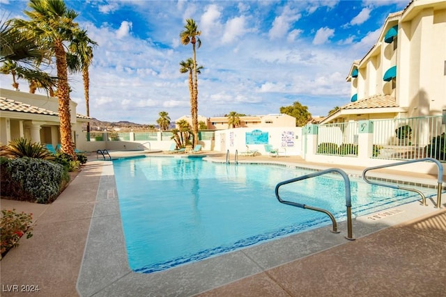 view of pool featuring a patio