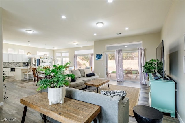 living room featuring light wood-type flooring