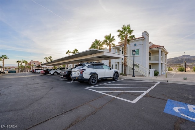 view of parking featuring a mountain view