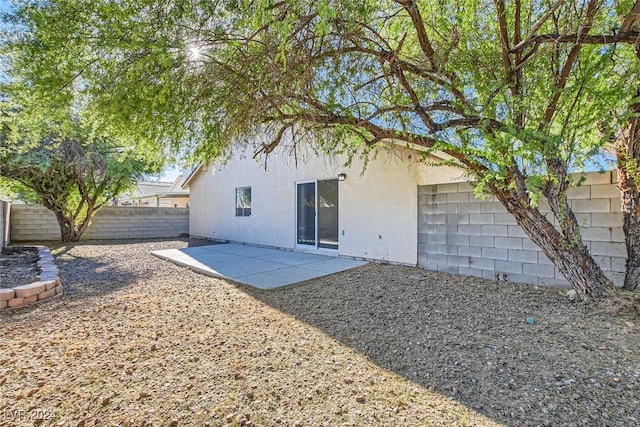 back of house featuring a patio area