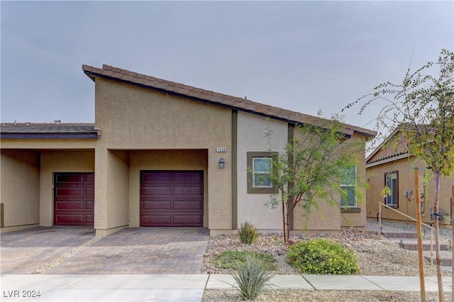 view of front of home featuring a garage