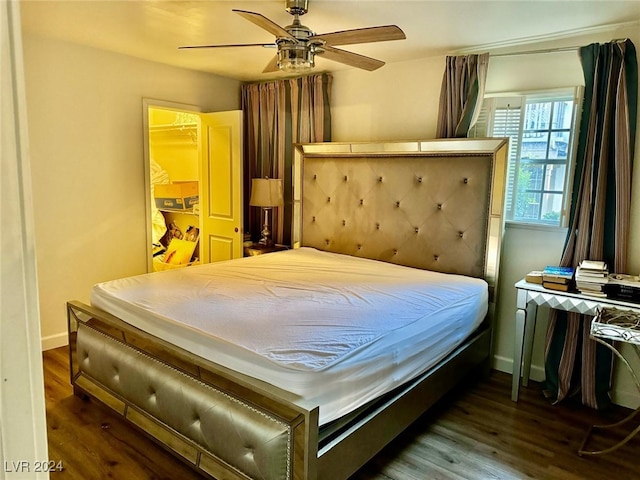 bedroom featuring dark hardwood / wood-style floors and ceiling fan