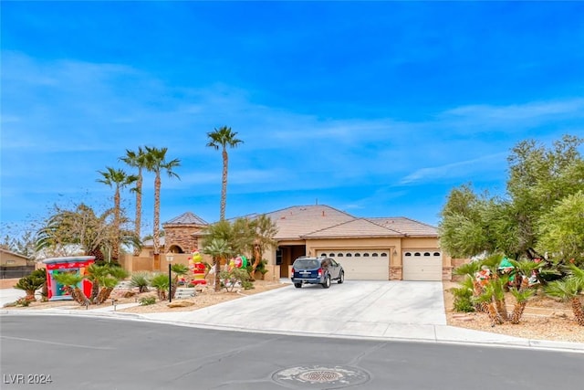 view of front of home with a garage