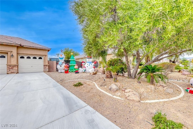 view of yard featuring a garage