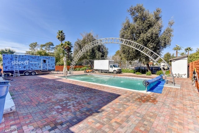 view of pool with a patio area