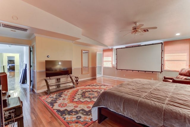 bedroom featuring vaulted ceiling and hardwood / wood-style floors