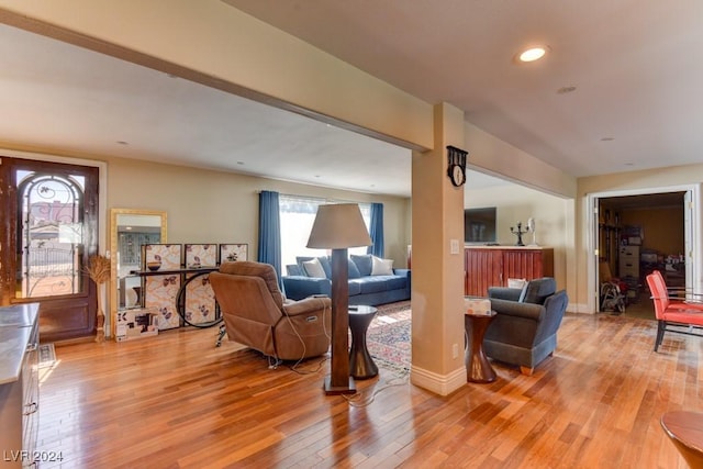 living room with light hardwood / wood-style flooring