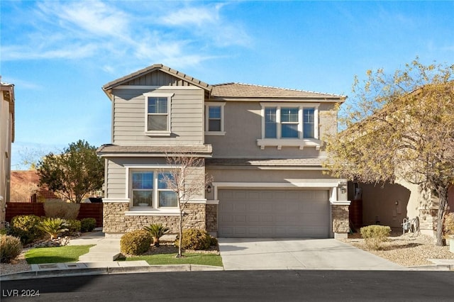 view of front of home with a garage