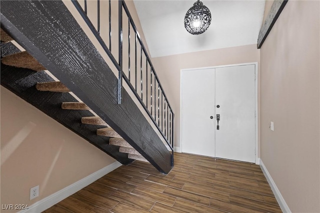 foyer with wood-type flooring