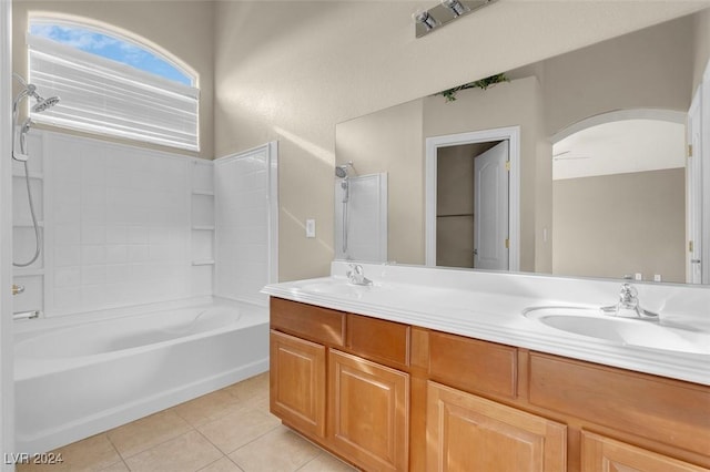 bathroom with vanity, tile patterned flooring, and shower / bathing tub combination