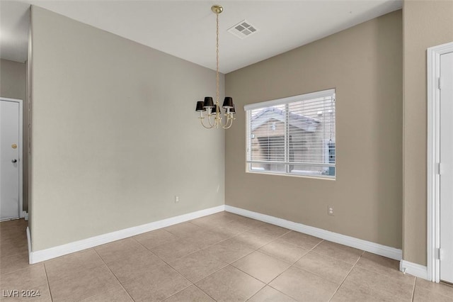 unfurnished dining area with light tile patterned flooring and a notable chandelier