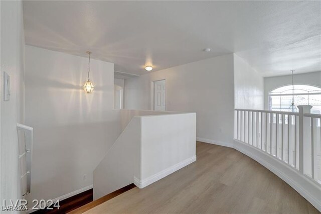 empty room with wood-type flooring