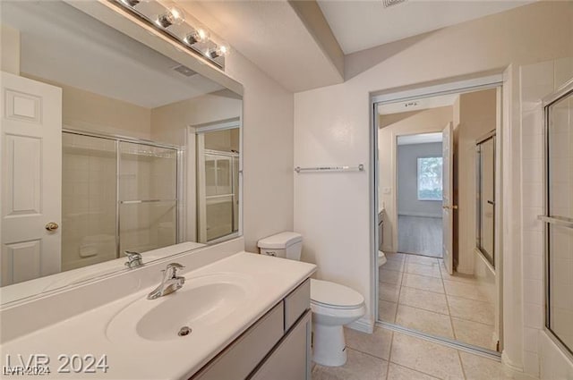 bathroom with tile patterned floors, vanity, and toilet