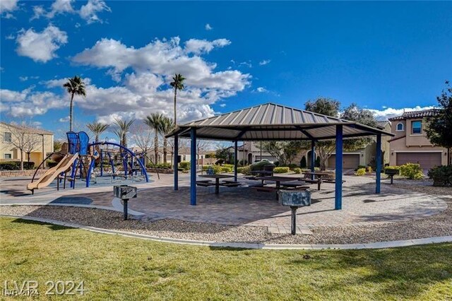 view of playground with a gazebo and a yard