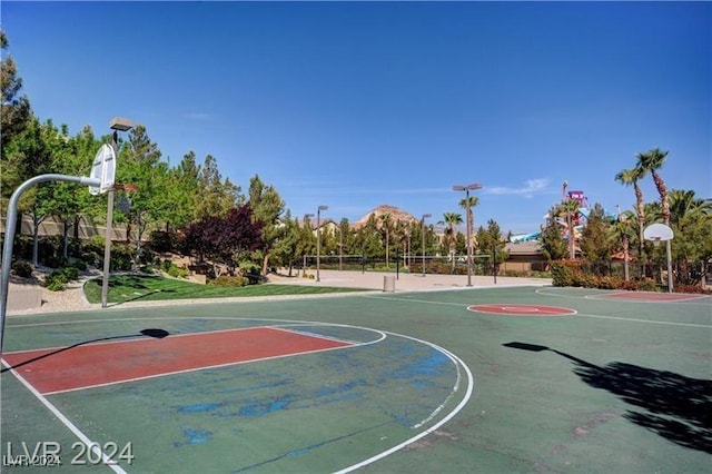 view of basketball court featuring volleyball court