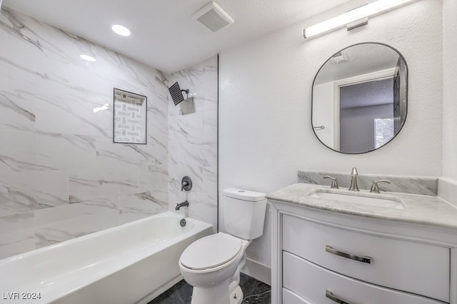 full bathroom featuring vanity, toilet, and tiled shower / bath