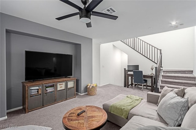 living room with ceiling fan and carpet floors