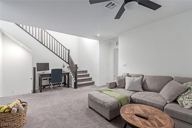 living room with carpet flooring and ceiling fan