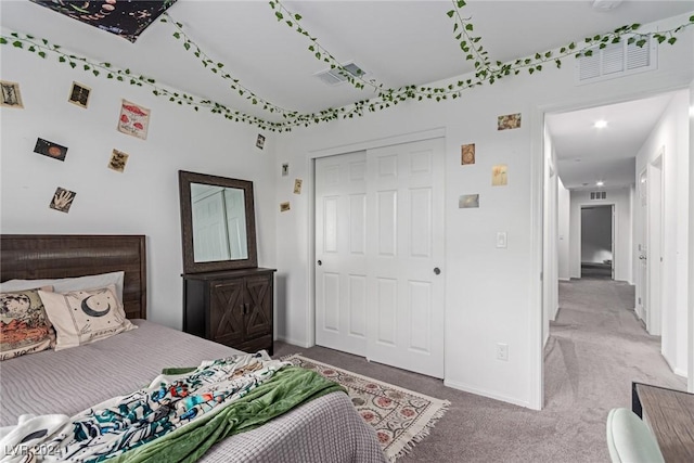 bedroom featuring a closet and carpet