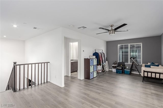 interior space featuring ceiling fan and light hardwood / wood-style floors