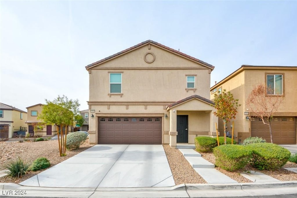 front of property featuring a garage