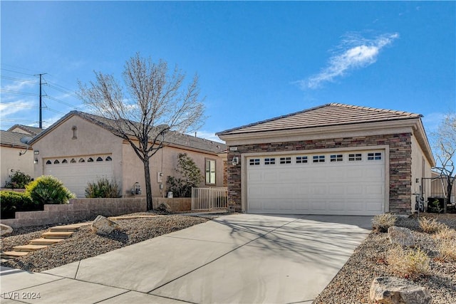 single story home with a garage