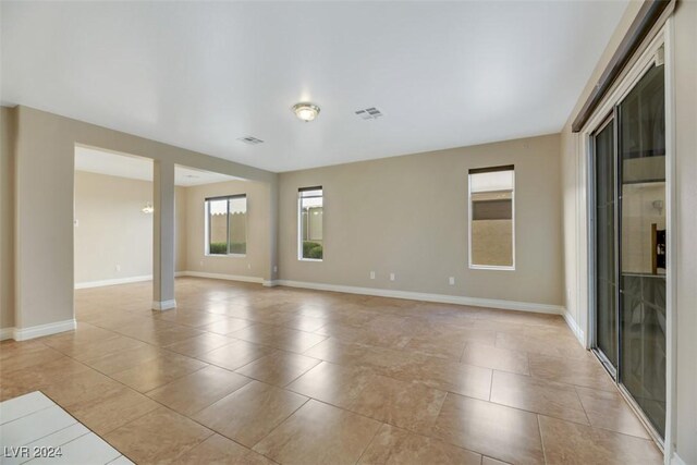 view of tiled spare room