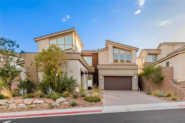 view of front of property featuring a garage