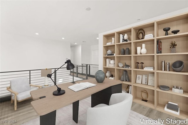 home office featuring light hardwood / wood-style flooring