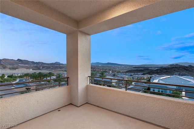 balcony featuring a mountain view