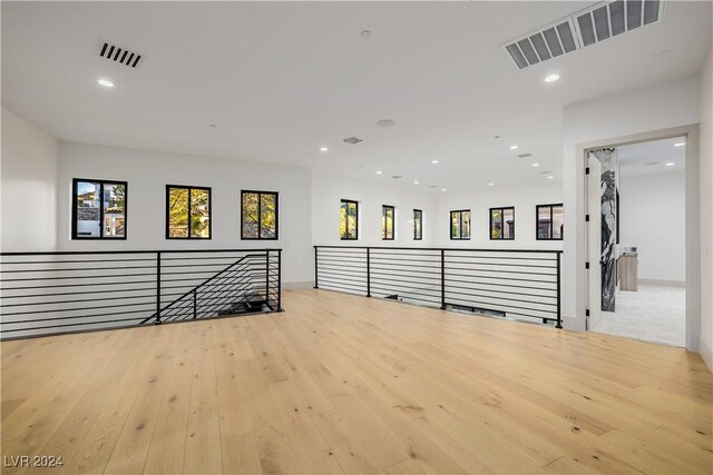 unfurnished room featuring light wood-type flooring