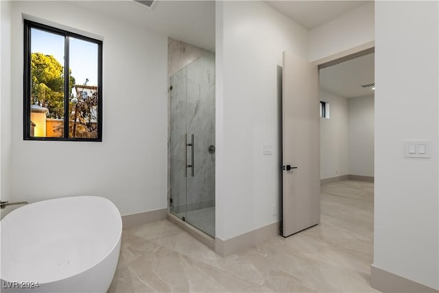 bathroom featuring plus walk in shower