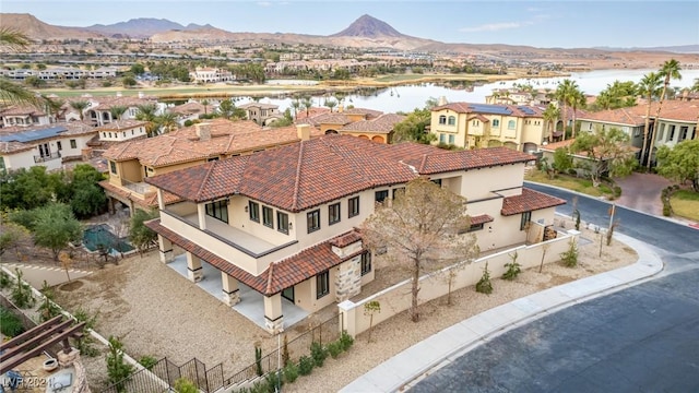 bird's eye view featuring a water and mountain view