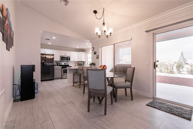 dining space with vaulted ceiling, visible vents, crown molding, and an inviting chandelier