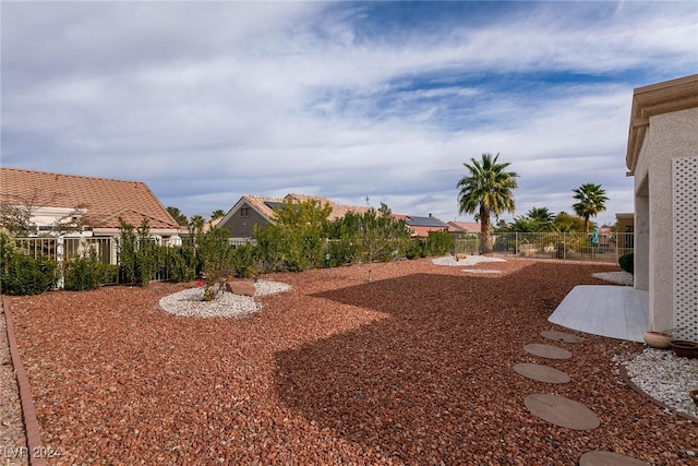 view of yard featuring a patio area and fence