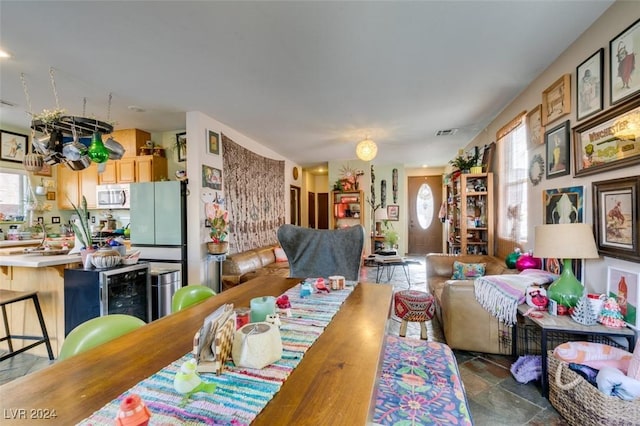 dining area featuring beverage cooler