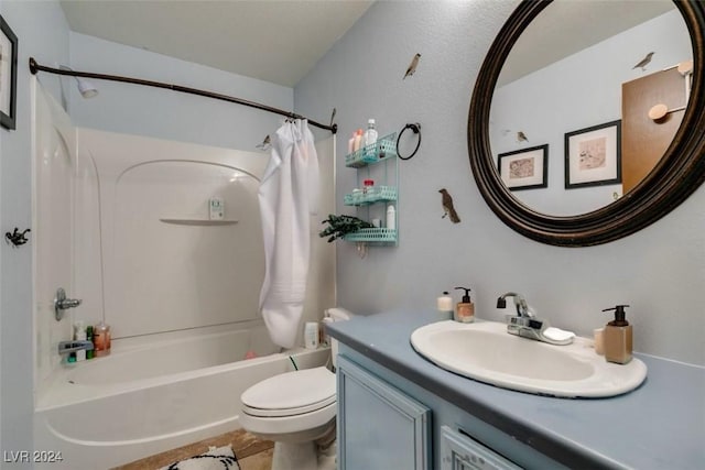 full bathroom with shower / bath combination with curtain, vanity, and toilet