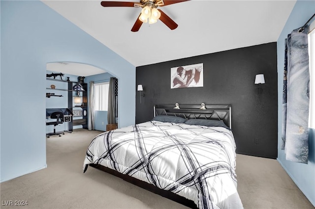 bedroom featuring ceiling fan and light carpet