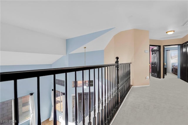 hallway with carpet flooring