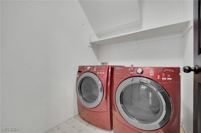 washroom featuring washer and dryer