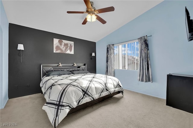 bedroom featuring ceiling fan, light carpet, and lofted ceiling