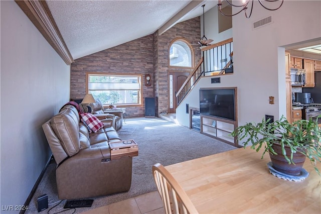 carpeted living room with beam ceiling, high vaulted ceiling, a textured ceiling, and a notable chandelier