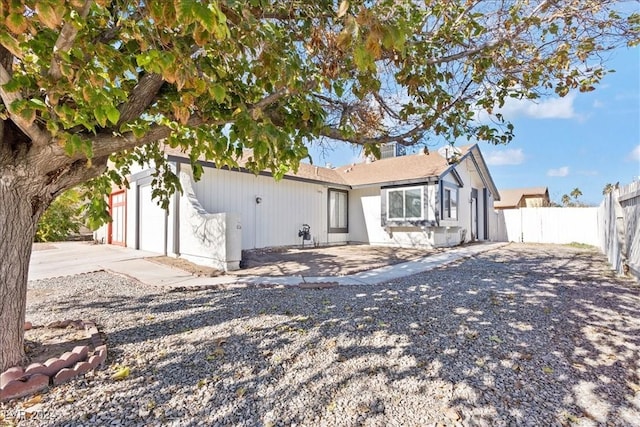 exterior space with a garage