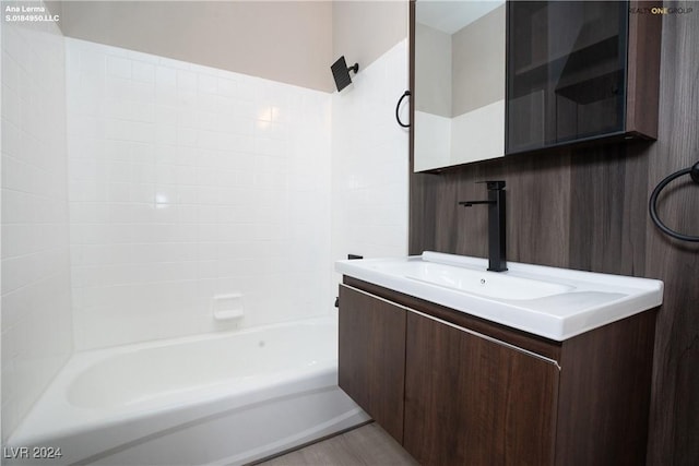 bathroom featuring vanity and shower / bath combination