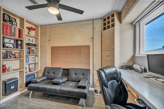 713 Antelope Way, Las Vegas, NV 89145 - office area with a textured ceiling, ceiling fan, and wood finished floors