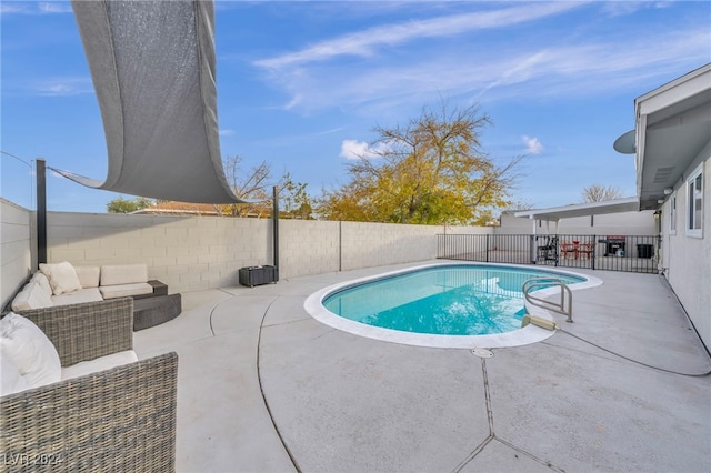 713 Antelope Way, Las Vegas, NV 89145 - view of pool with a patio, a fenced backyard, and an outdoor living space